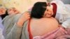 Government Think Tank: China Could Further Ease Childbirth Curbs