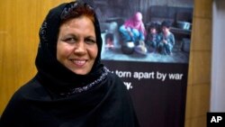 Afghan refugee teacher Aqeela Asifi won a major UN prize and $100,000 to continue teaching refugee Afghan girls in Pakistan. (AP Photo/Anjum Naveed)