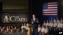 Republican presidential candidate and former Massachusetts Gov. Mitt Romney speaks to Citadel cadets and supporters during a campaign speech inside Mark Clark Hall on the Citadel campus in Charleston, South Carolina, Octorber 7, 2011.