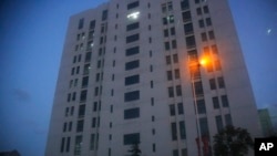 The building housing “Unit 61398” of the People’s Liberation Army is seen in the outskirts of Shanghai, Tuesday Feb. 19, 2013. 