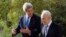Israel's President Shimon Peres and U.S. Secretary of State John Kerry speak during their meeting in Jerusalem, April 8, 2013. 