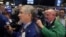 Traders work on the floor of the New York Stock Exchange shortly before the closing bell in New York, Jan. 6, 2017. 