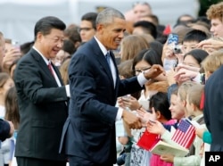 Students from D.C. Chinese immersion school meet Presidents Xi and Obama. (AP PHOTO)