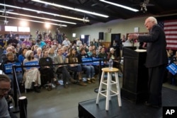Democratic presidential candidate Sen. Bernie Sanders of Vermont speaks during a campaign rally at the Delaware County Fairgrounds in Manchester, Iowa, Jan. 30, 2016.