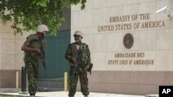 Kenyan police stand guard outside the U.S. embassy in Port-au-Prince on July 5, 2024. (Odelyn Joseph/AP)