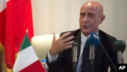 Italian Interior Minister Marco Minniti speaks during a meeting with Libyan Interior Minister Al-Arif Saleh Al-Khoja and the mayors of Libyan municipalities, to discuss the problem they face with migrants attempting to cross the Mediterranean Sea, July 13, 2017.