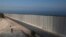 An Israeli soldier stands near a wall at the Israel Lebanon border near Rosh Haniqra, northern Israel, Sept. 5, 2018. Even with attention currently focused on Gaza-based Hamas militants along its southern border, Israel's most pressing security concerns lie to the north. 