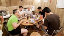 The Mars500 crew is shown having breakfast together inside one of the facility’s modules. (European Space Agency/Institute for Biomedical Problems)