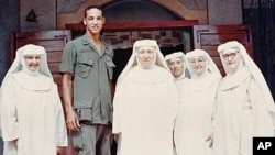 Dr. Augustus White, with a group of nuns at a Leper Colony in Vietnam in the late 1960s, as he was becoming increasingly aware of medical discrimination against minorities.