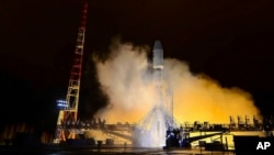 FILE - A Russian Soyuz-2 booster rocket takes off from the Plesetsk launch facility in northwestern Russia, Oct. 25, 2018. The rocket put a military satellite in orbit.
