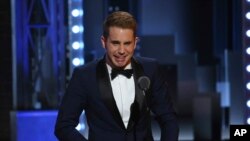 Ben Platt is emotional as he accepts the award for best performance by an actor in a leading role in a musical for "Dear Evan Hansen" at the 71st annual Tony Awards on Sunday, June 11, 2017, in New York. (Photo by Michael Zorn/Invision/AP)