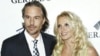 Britney Spears Gets Engaged; Madonna Signs New Record Deal