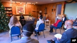 Secretary of State Anthony Blinken meets with recently resettled Afghans and with staff members and volunteers from local refugee resettlement agencies at the Lutheran Immigration and Refugee Service in Alexandria, Va., on Dec. 20, 2021. 