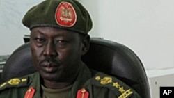 SPLA spokesman Philip Aguer, shown here at a briefing in March 2012, confirmed on Wednesday, May 8, 2013, that rebels led by David Yau Yau seized the town of Boma, in Jonglei state. (AP)