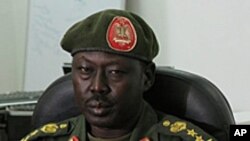 FILE - SPLA spokesman Philip Aguer, shown here at a briefing in March 2012, says that “if there are spoilers for the peace agreement, those spoilers at least are not on our side.”