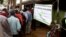 FILE - Kenyan voters line up to cast their votes in the Kibera slum, Nairobi, Kenya.