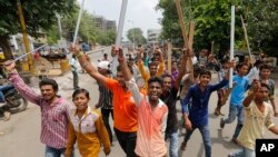 Members of India’s low-caste Dalit community in Ahmadabad, India, July 20, 2016. 