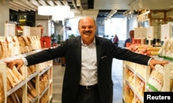 FILE - Oscar Farinetti, founder and creator of Eataly, poses at the newly opened first Russian store of Italian upmarket food chain Eataly in Moscow, Russia, May 25, 2017.