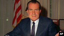 Richard Nixon at his desk at the White House 