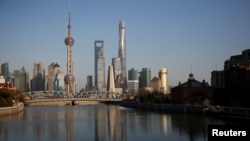 FILE - A general view of Shanghai's financial district of Pudong is seen in Shanghai, China, March 14, 2017. 