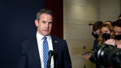 FILE - Congressman Adam Kinzinger, a Republican from Illinois, speaks to reporters at the Capitol in Washington, May 12, 2021.