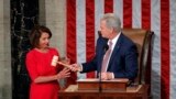 House speaker Nancy Pelosi of California, who will lead the 116th Congress as Speaker of the House is handed the gavel by Rep. Kevin McCarthy, R-Calif., at the U.S. Capitol in Washington, Jan. 3, 2019.