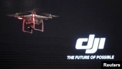 The DJI Phantom 3, a consumer drone, takes flight after it was unveiled at a launch event in Manhattan, New York, April 8, 2015.
