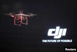 The DJI Phantom 3, a consumer drone, takes flight after it was unveiled at a launch event in Manhattan, New York, April 8, 2015.