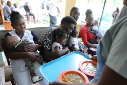 Food is served in a program for undernourished children at St. Luke Hospital in Port-au-Prince, Haiti, Jan. 29, 2020.