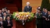 Newly re-elected Vietnam Communist Party General Secretary Nguyen Phu Trong, center, speaks at the closing ceremony of its five-yearly congress in Hanoi, Vietnam, Jan. 28, 2016. 