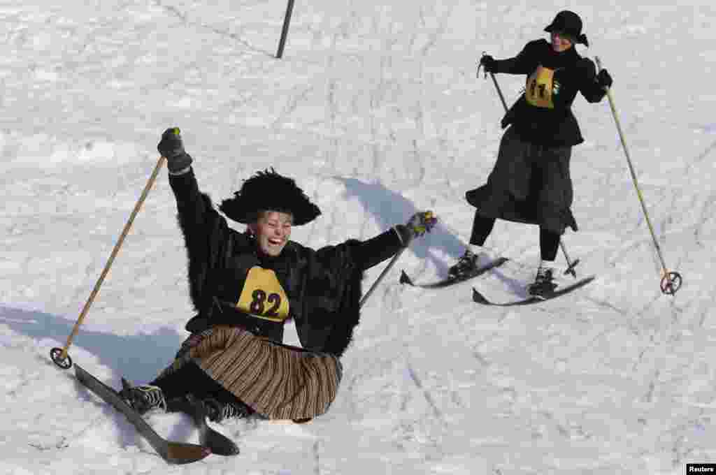 Participants compete during a traditional historical ski race in the northern Bohemian town of Smrzovka, Feb. 21, 2015.