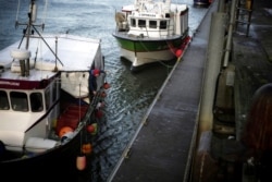 FILE - The Corentin-Lucas fishing boat arrives at the port of Boulogne-sur-Mer, France, Dec. 10, 2020. Fishing rights are a sticking point in negotiations between the U.K. and the European Union about a post-Brexit trade deal.