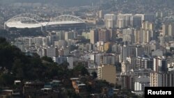 FILE - The Olympic Stadium undergoes renovations to stage athletic competitions during the Rio 2016 Olympic Games, in Rio de Janeiro, Brazil, Nov. 9, 2015. 