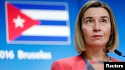 FILE - European Union foreign policy chief Federica Mogherini holds a news conference after meeting Cuba's Foreign Minister Bruno Rodriguez at the EU Council in Brussels, Belgium.