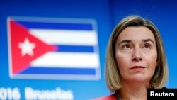 FILE - European Union foreign policy chief Federica Mogherini holds a news conference after meeting Cuba's Foreign Minister Bruno Rodriguez at the EU Council in Brussels, Belgium.