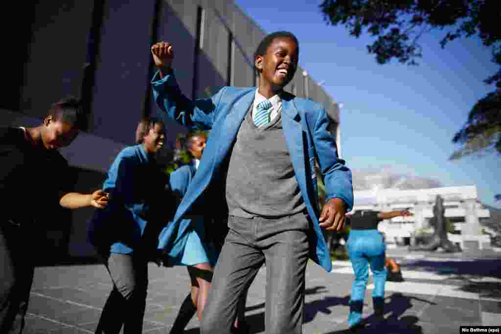South African school children from Chris Hani High dance during Africa Day celebrations at the Artscape Theatre in Cape Town.
