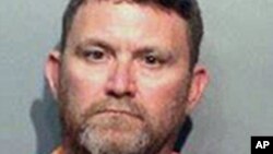 Skot Majkl Grin, 46-godišnji stanovnika Urbandejla optužen za ubistva policajaca