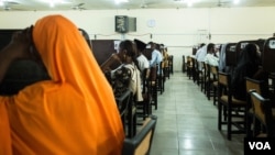 Students take their final exams at the computer science department. More than 20,000 students are enrolled at the University of Maiduguri. (C. Oduah/VOA)
