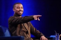 Actor Michael B. Jordan speaks with Oprah Winfrey on stage during a taping of her TV show in the Manhattan borough of New York City, New York, U.S., February 5, 2019. REUTERS/Carlo Allegri