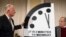 Former California Gov. Jerry Brown (L) and former Secretary of Defense William Perry unveil the Doomsday Clock during The Bulletin of the Atomic Scientists news conference in Washington, Jan. 24, 2019. 