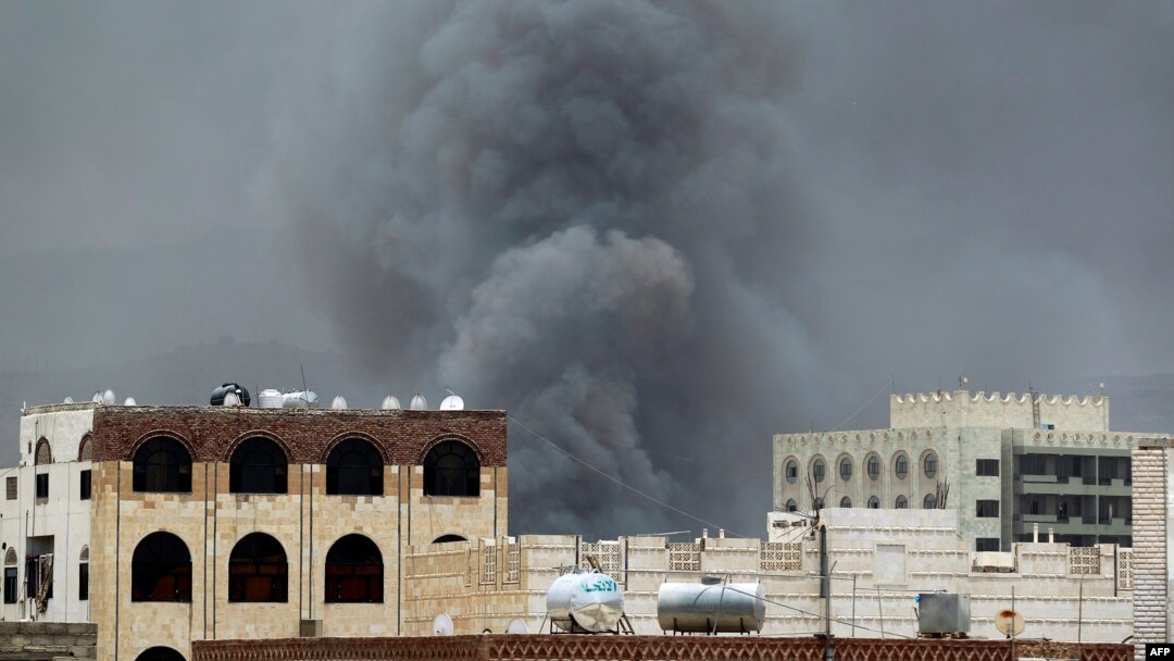 FILE - Smoke billows following an airstrike by the Saudi-led coalition in Sanaa, Yemen, May 27, 2015.