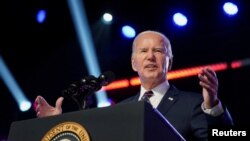 U.S. President Joe Biden delivers a speech to mark the third anniversary of the January 6, 2021 attacks on the U.S Capitol in Blue Bell, Pennsylvania