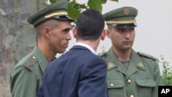 Algerian soldiers attend a welcome ceremony with other foreign soldiers from 80 nations that fought for France in World War I, and descendants of veterans in Paris, July 7, 2014.