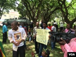 Police maintained a heavy presence at a Harare protest march but did not deter activists from accusing President Robert Mugabe’s government of failing to respect human rights, March 9, 2016. (S. Mhofu/VOA)