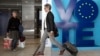 A man walks by an installation encouraging people to vote in the European elections at Luxembourg metro station in Brussels, May 24, 2019. About 400 million Europeans from 28 countries will head to the polls May 23-26 to choose lawmakers to represent them