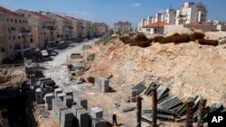 FILE - a general view of a construction site in the West Bank Jewish settlement of Modiin Illit, March 14, 2011.