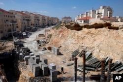 FILE - A general view of a construction site in the West Bank Jewish settlement of Modiin Illit, March 14, 2011.