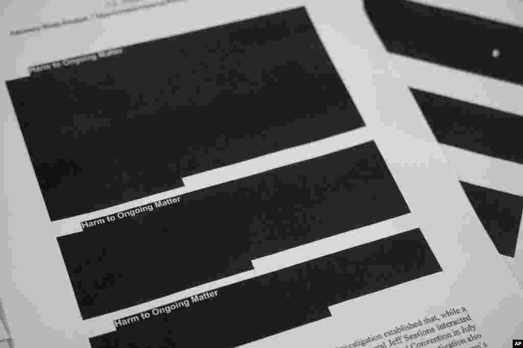 Special counsel Robert Mueller&#39;s report, with heavy redactions, as released is photographed in Washington.