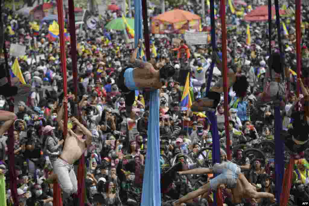 Artists perform as they take part in a protest against the government of Colombian President Ivan Duque, in Bogota, May 15, 2021. Clashes between police and demonstrators in anti-government protests since April 28 have resulted in at least 42 deaths, including one police officer.