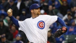 Chicago Cubs starting pitcher Ryan Dempster delivers during the first inning of an opening day baseball against the Pittsburgh Pirates, Friday, April 1, 2011 in Chicago